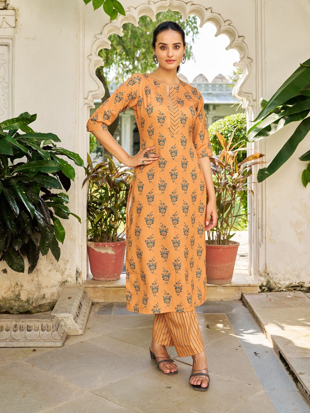 

Moda Rapido Floral Printed Notch Neck Straight Kurta With Trouser, Mustard