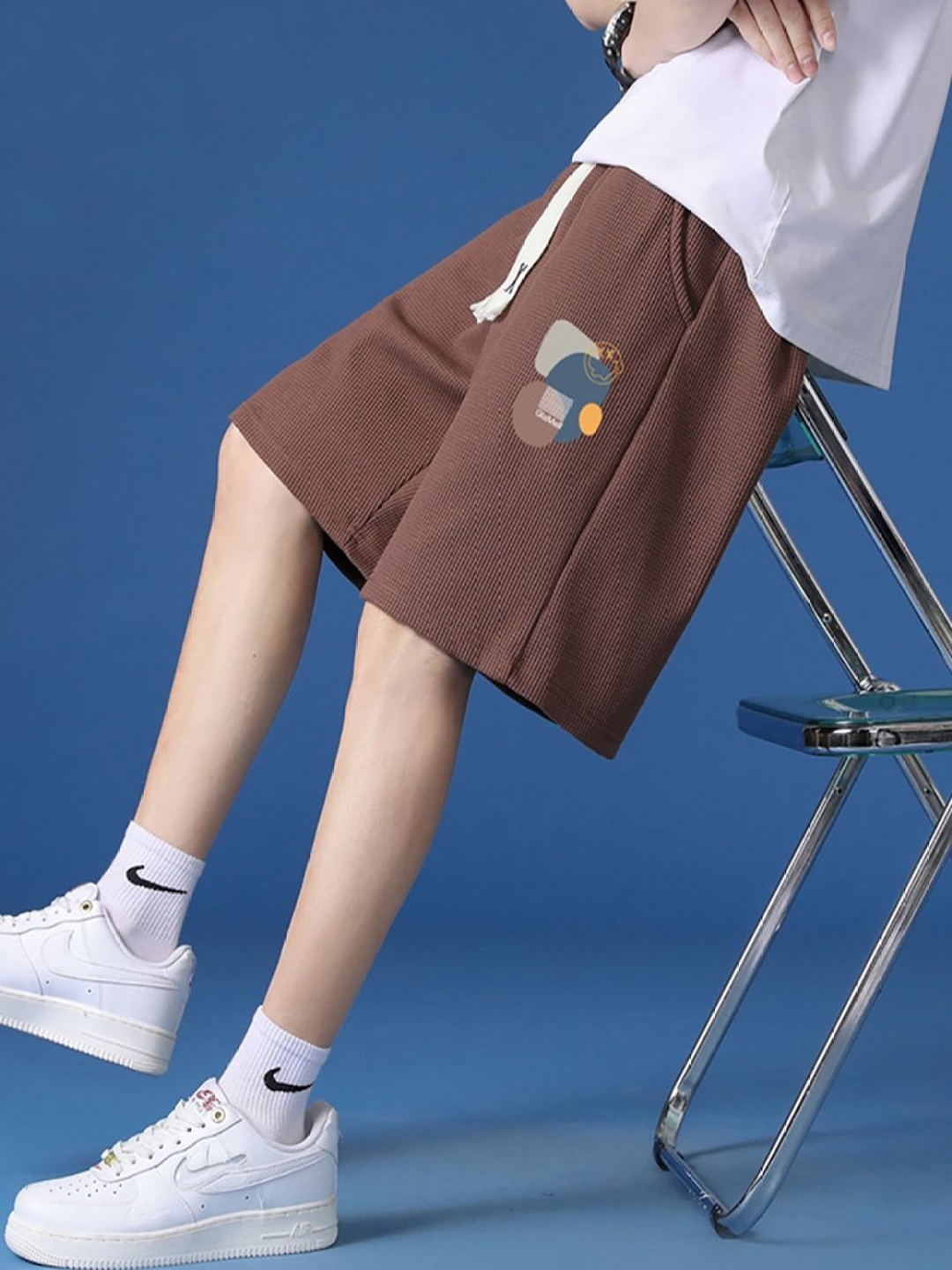 

StyleCast x Revolte Men Printed Shorts, Coffee brown