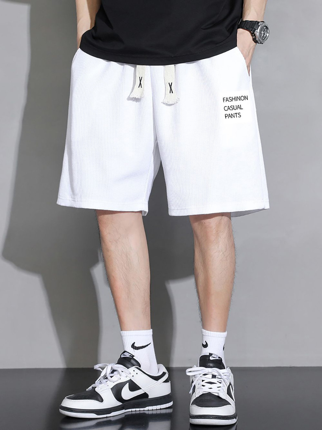 

StyleCast x Revolte Men Typography Printed Regular Fit Mid-Rise Shorts, White