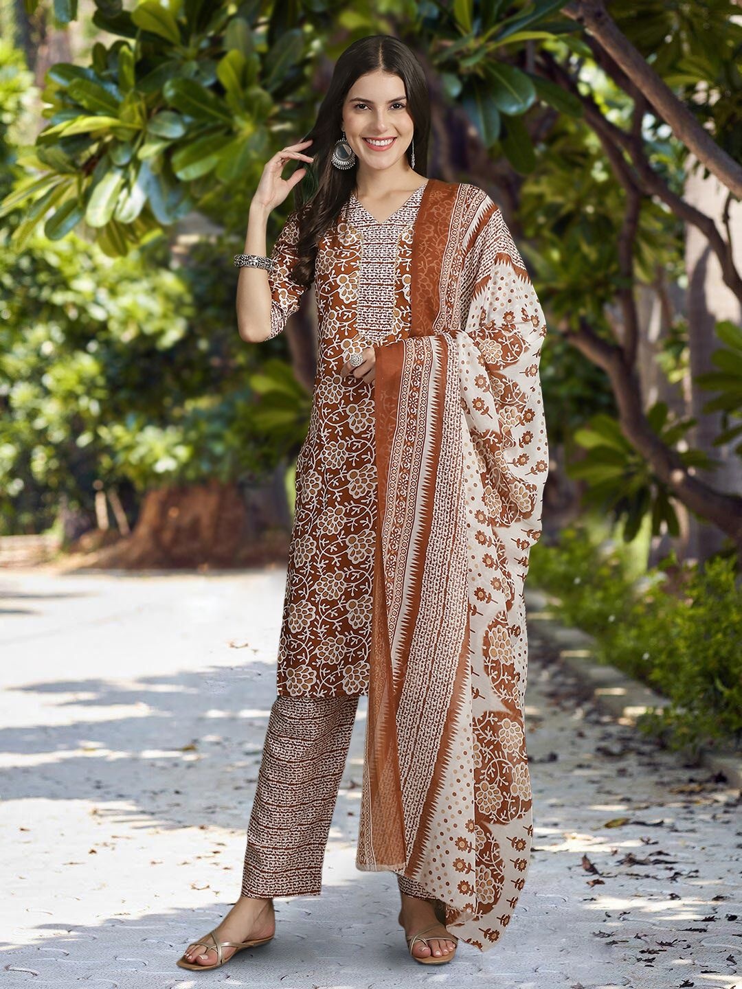 

Moda Rapido Floral Printed V-Neck Straight Kurta With Trousers And Dupatta, Brown