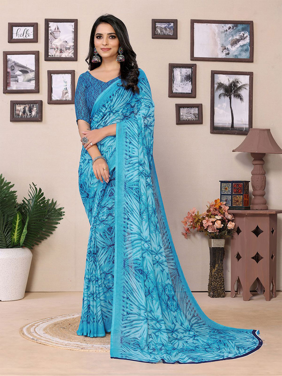 

Moda Rapido Floral Printed Saree, Blue