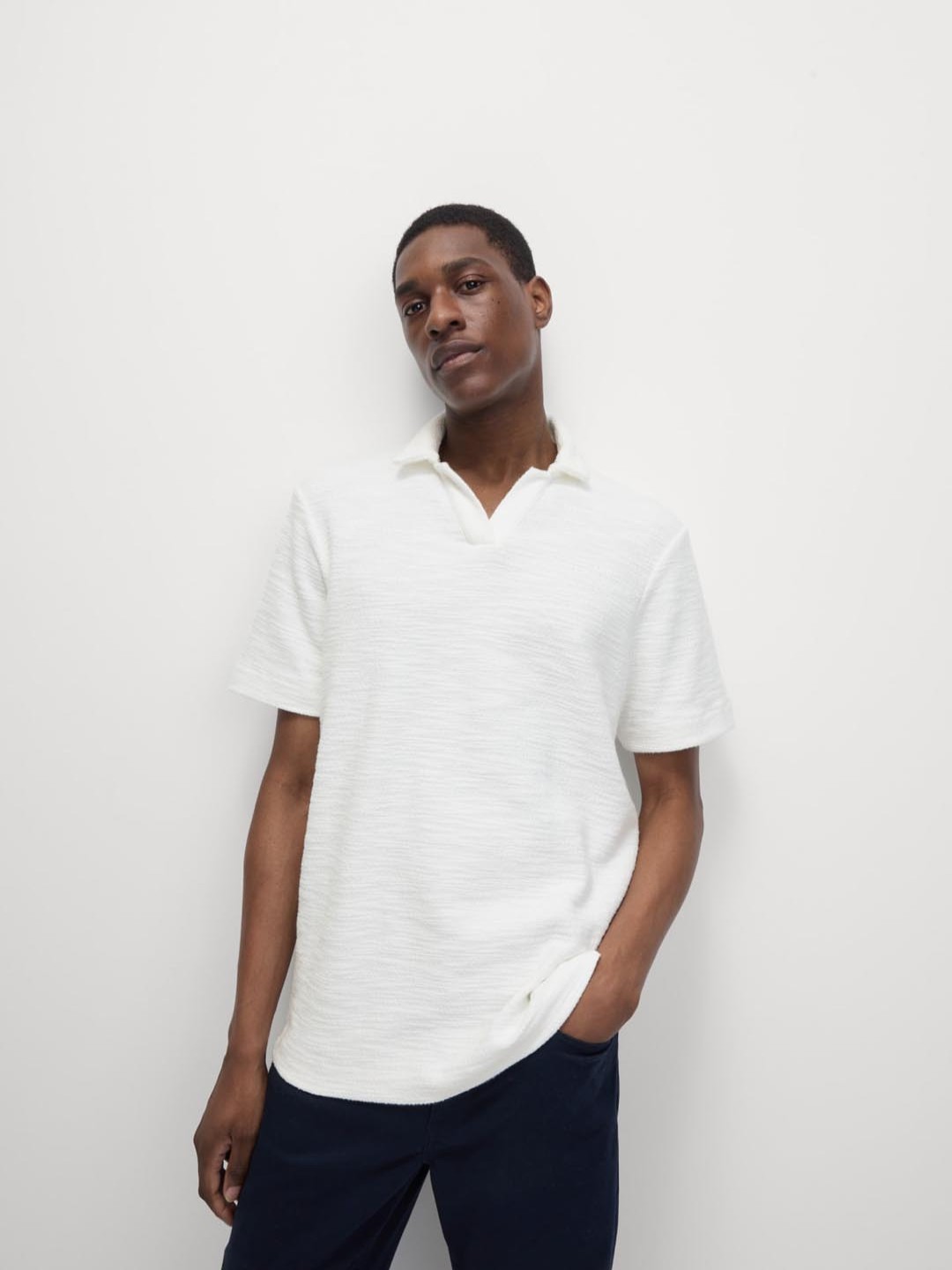 

Marks & Spencer Men Self Design Polo Collar Cotton T-shirt, White