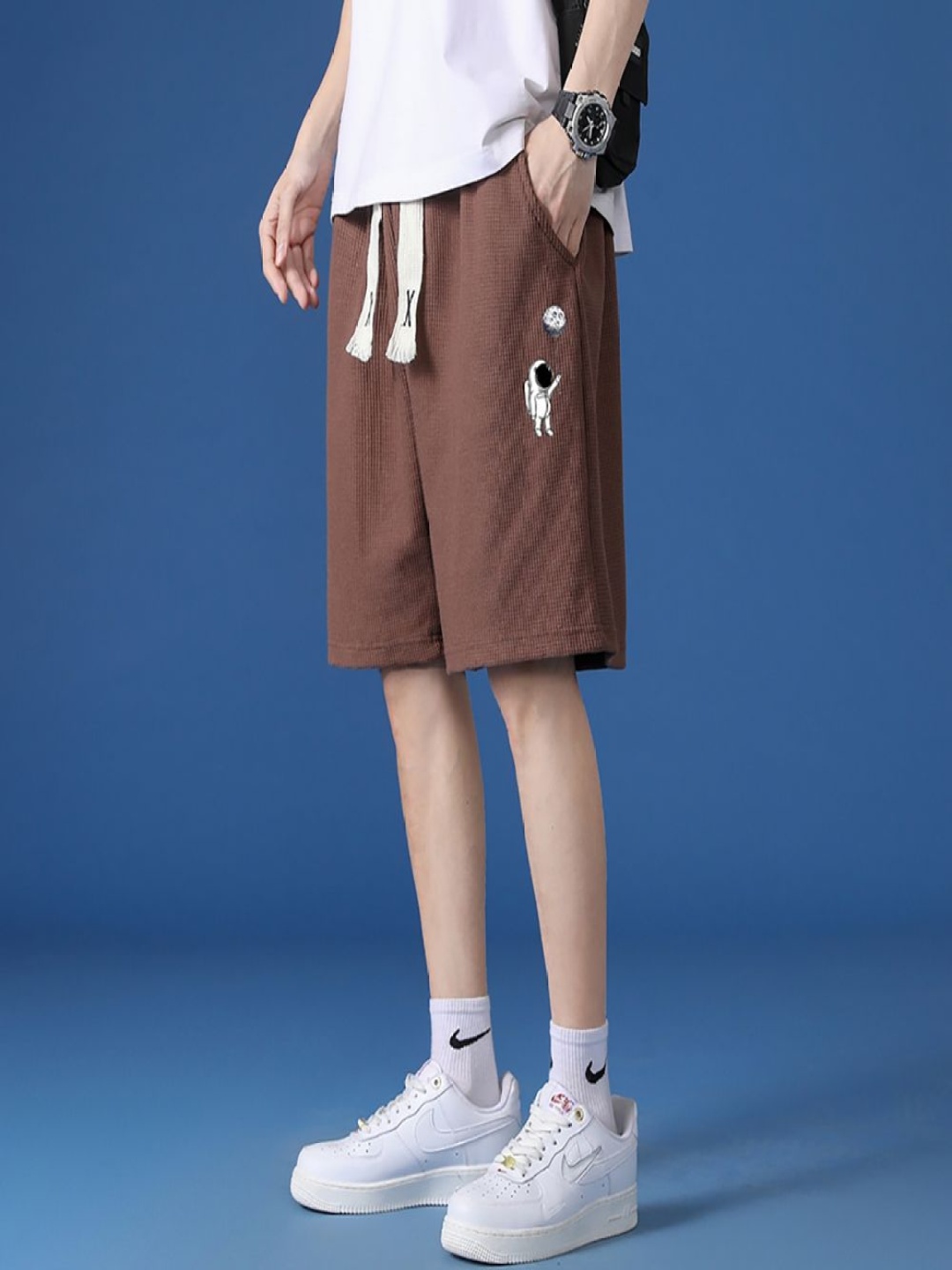 

StyleCast x Revolte Men Printed Shorts, Coffee brown