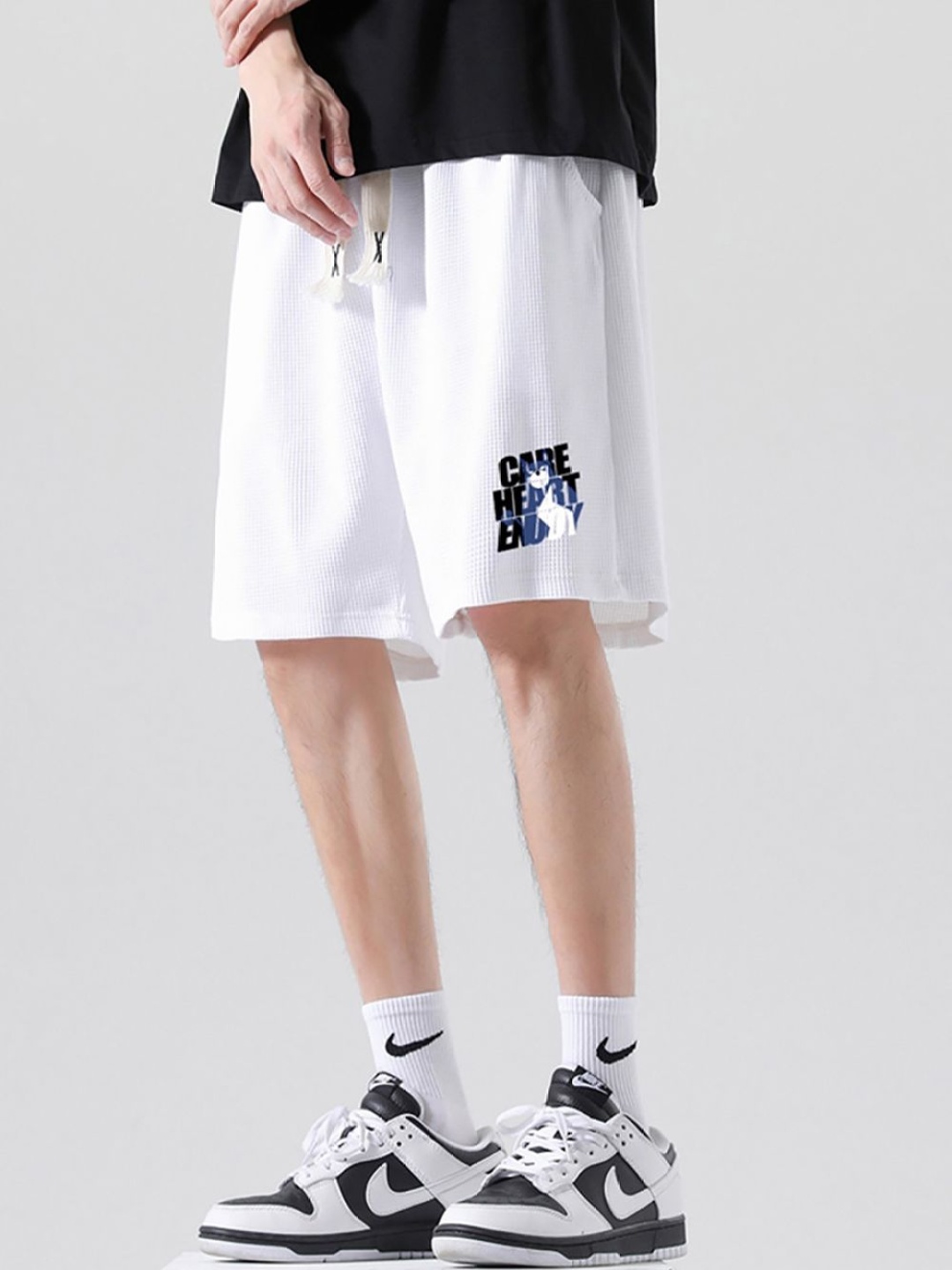 

StyleCast x Revolte Men Printed Mid-Rise Shorts, White