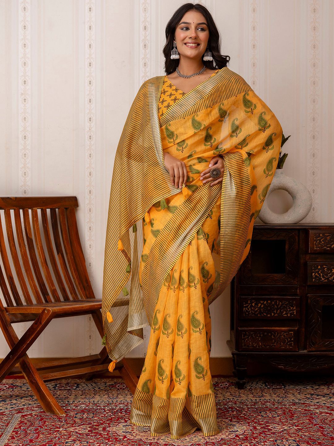 

Mitera Ethnic Motifs Printed Saree, Yellow