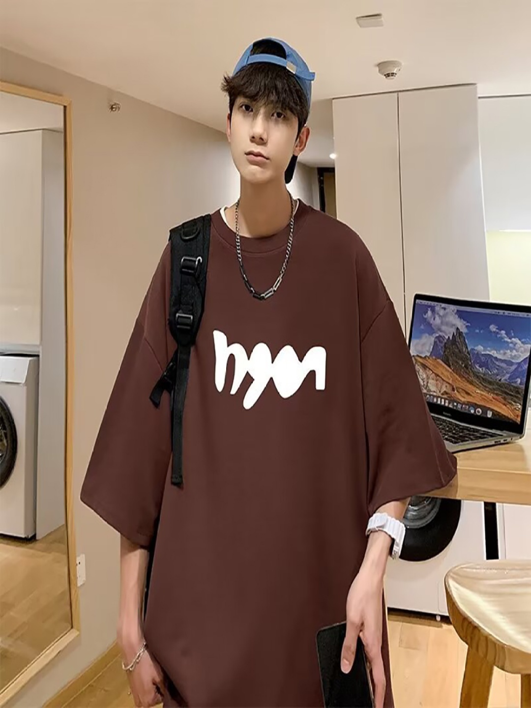 

StyleCast x Revolte Men Graphic Printed Round Neck Oversized T-shirt, Coffee brown