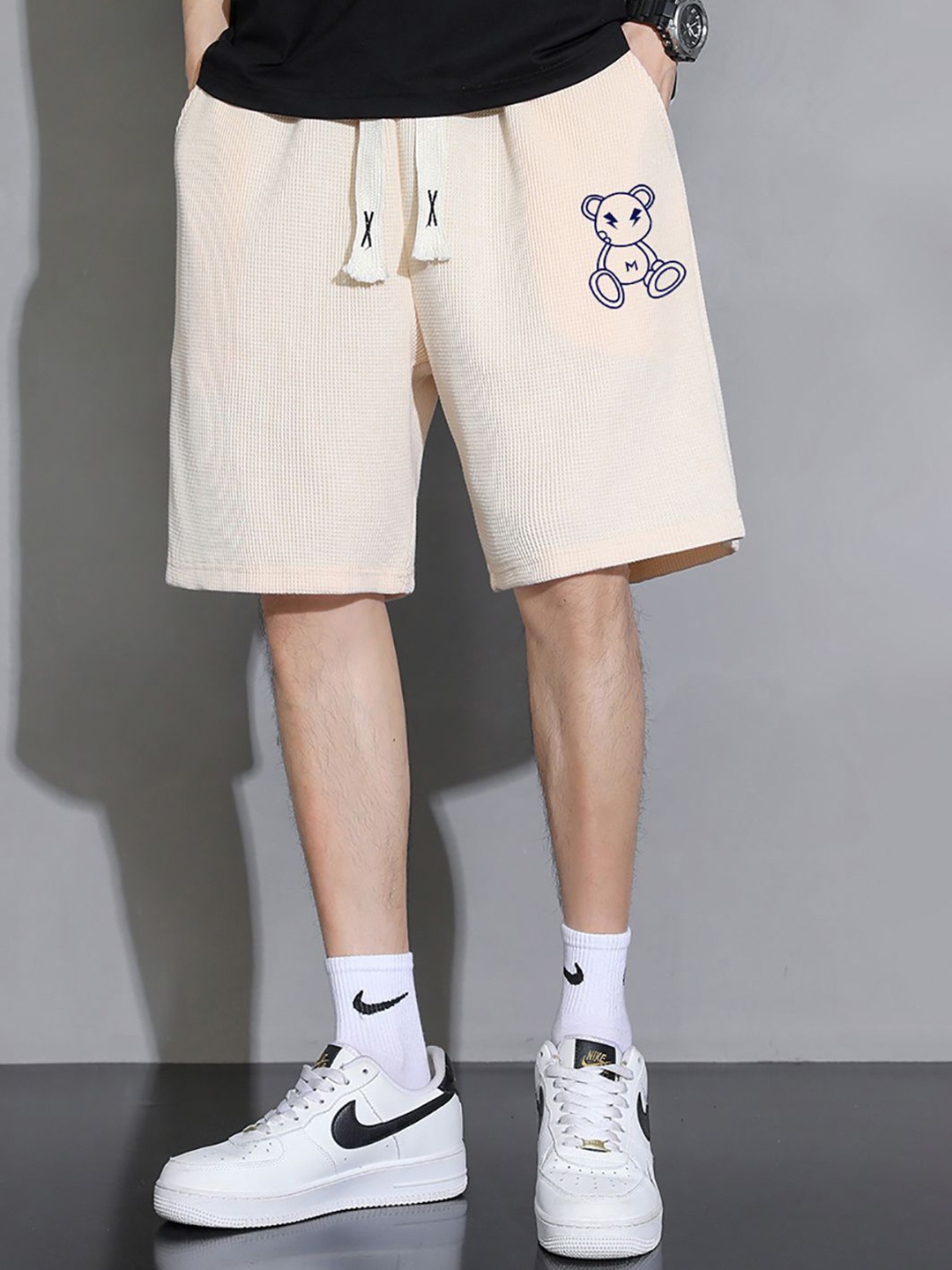 

StyleCast x Revolte Men Animal Printed Shorts, Beige