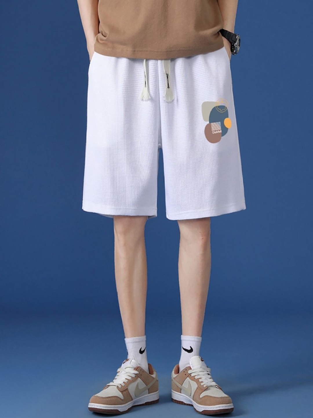 

StyleCast x Revolte Men Printed Shorts, White