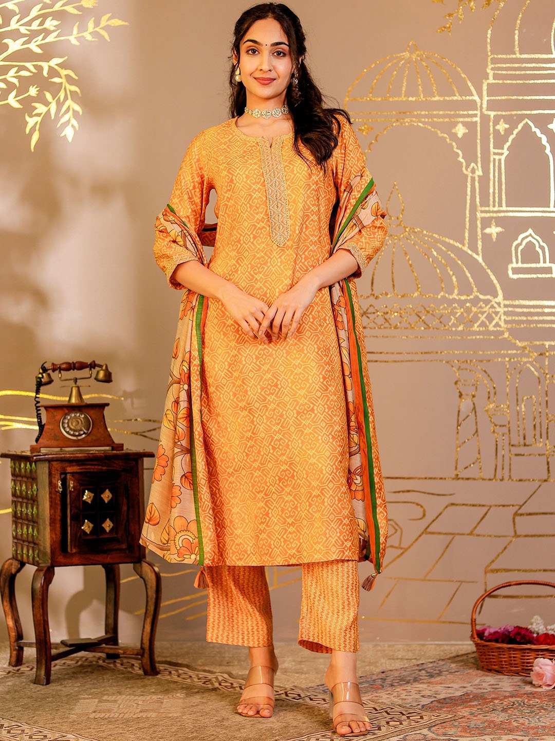 

Chandbaali Women Printed Regular Chanderi Cotton Kurta with Trousers & With Dupatta, Yellow