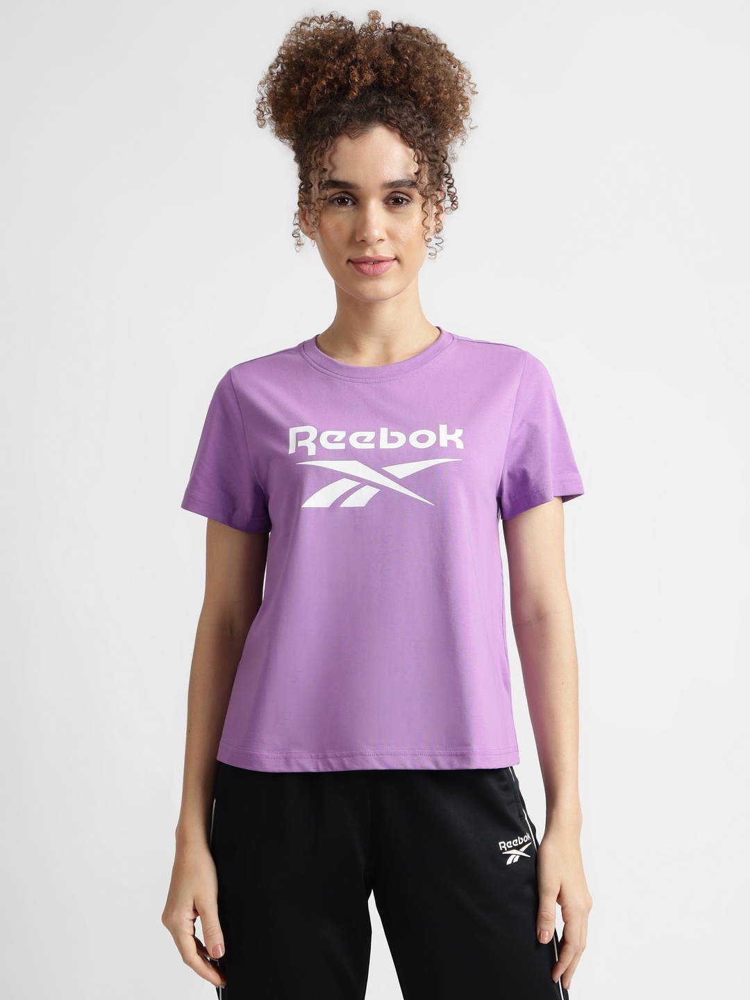 

Reebok Women Graphic Printed Short Sleeves Cotton Boxy Fit Casual T-shirt, Purple