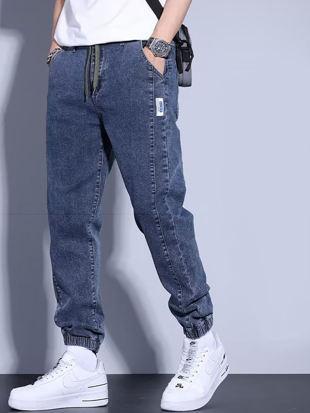 

StyleCast x Revolte Men Relaxed Fit Light Fade Jeans, Blue