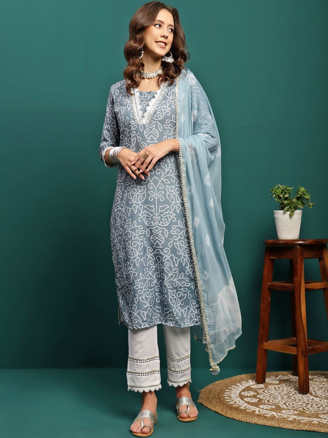 

Sangria Grey Bandhani Printed Notch Neck Mirror Work Straight Kurta With Trouser & Dupatta