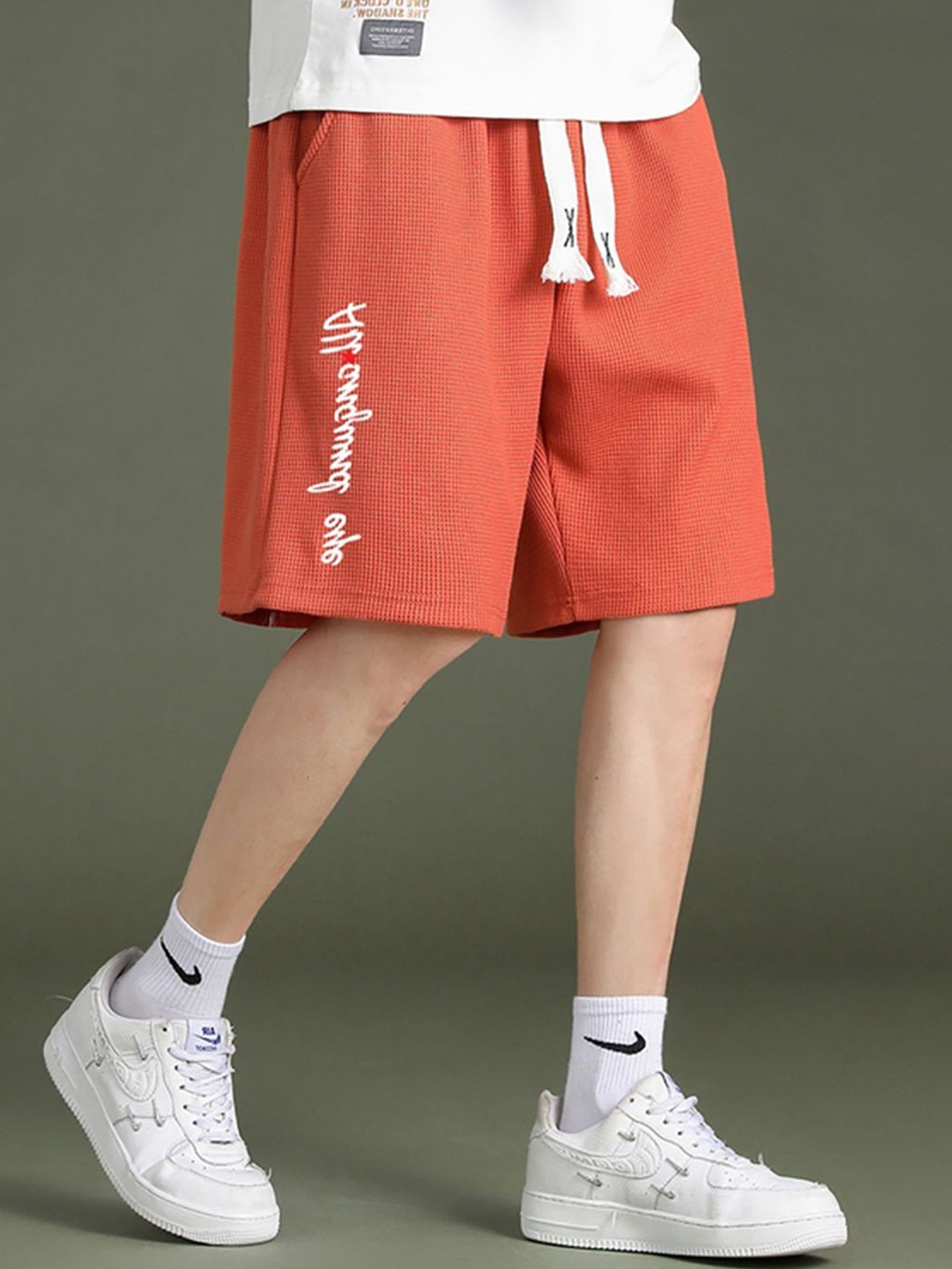 

StyleCast x Revolte Men Printed Shorts, Orange