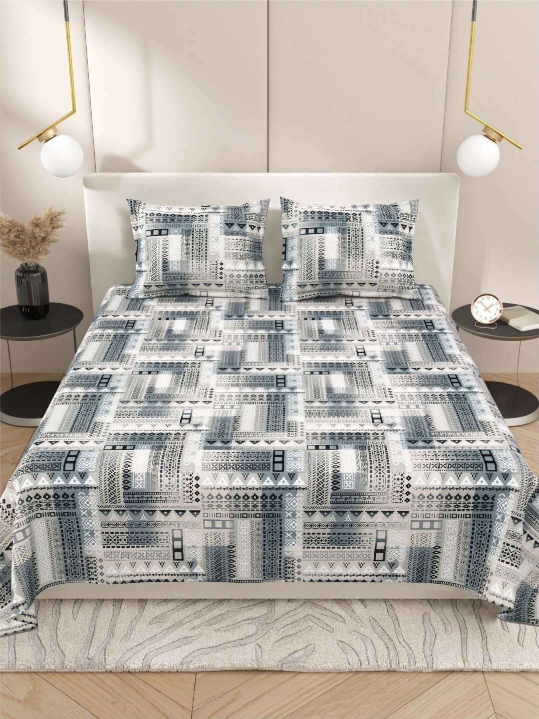 

DREAM WEAVERZ Grey & White Ethnic Motifs Printed 220 TC King Bedsheet Set 275 CM X 255 CM