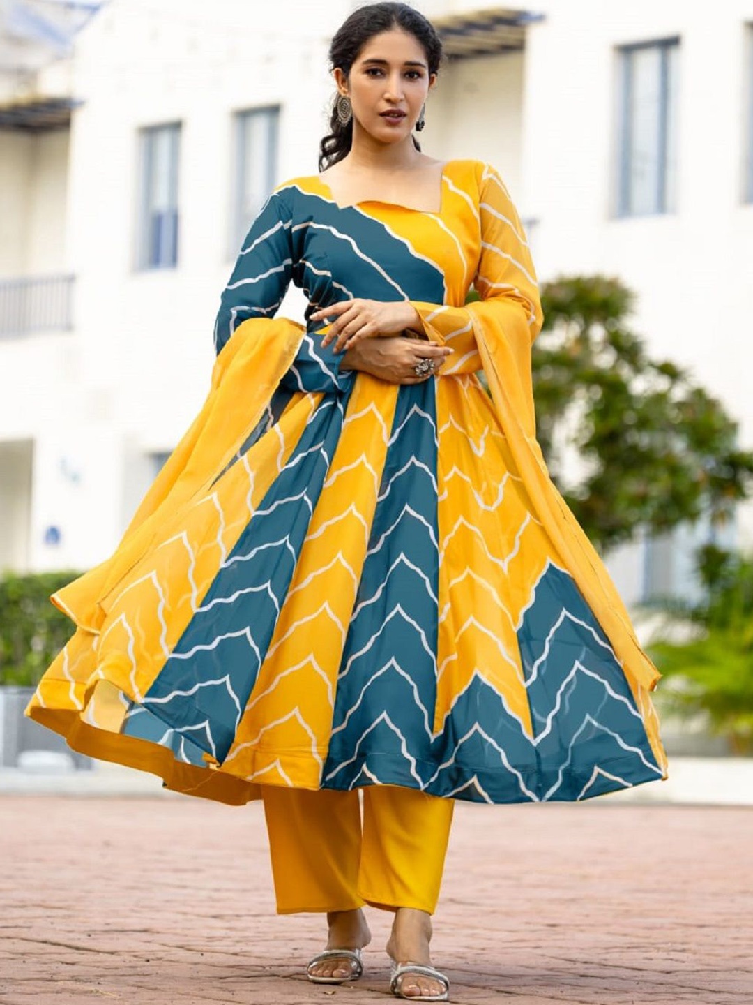 

Moda Rapido Leheriya Printed Square Neck Panelled Anarkali Kurta With Trousers & Dupatta, Yellow