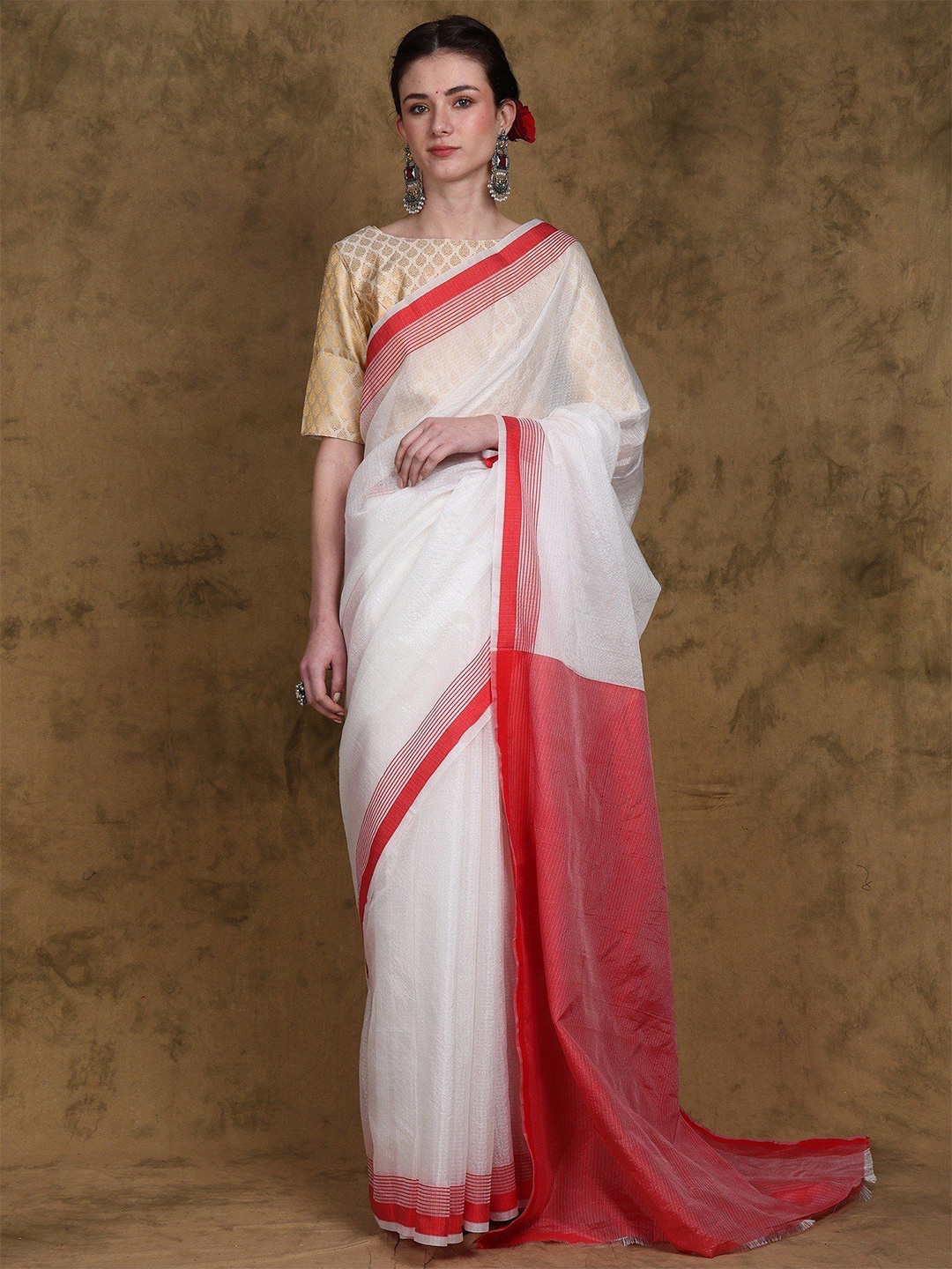 

Exotic India Lucent White Stripes Weave Banarasi Saree with Red Border