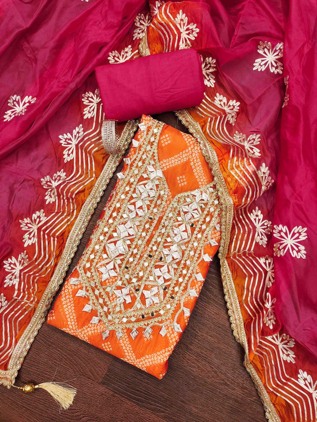 

Maroosh Bandhani Printed Gotta Patti Unstitched Dress Material, Orange