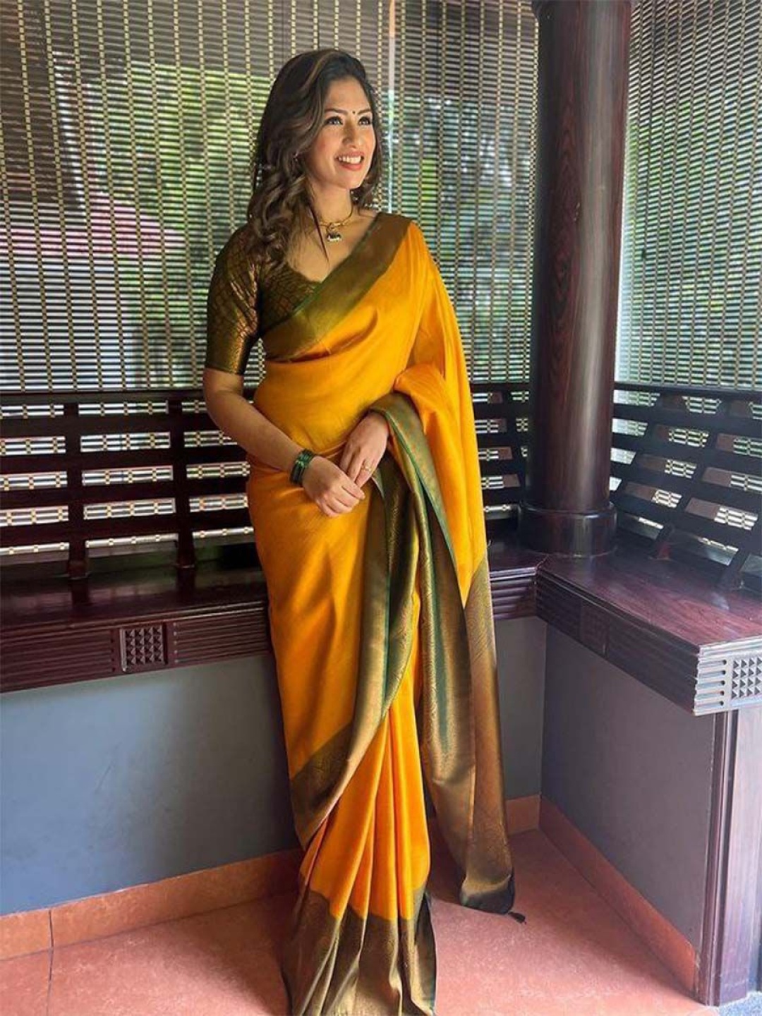

Manu Designer Woven Design Zari Saree, Yellow