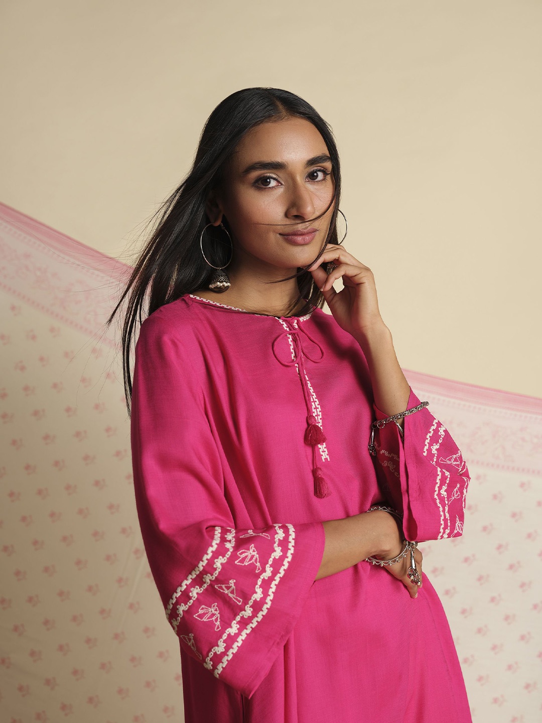 

Global Desi Geometric Embroidered Tie-Up Neck Flared Sleeves Thread Work Kurta, Pink