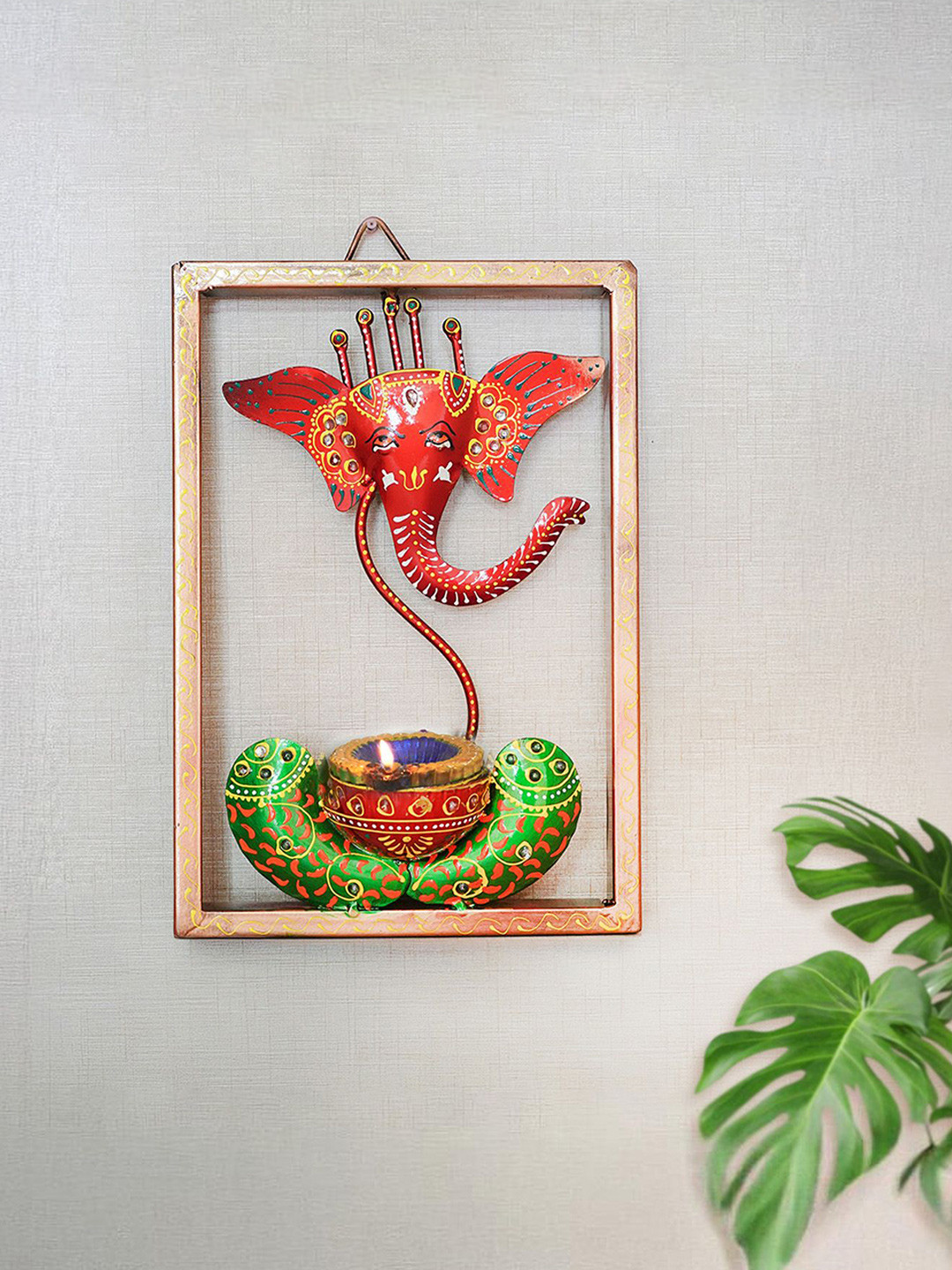 

Ekhasa Red & Green Textured Metal Ganesha Tealight Candle Holder Wall Hanging Decor