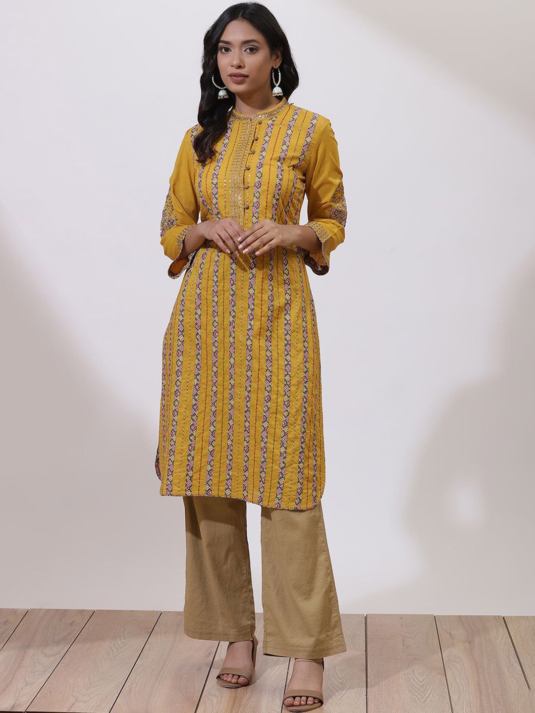 

Lakshita Floral Embroidered Sequinned Mandarin Collar Cotton Straight Nargis Kurta, Mustard