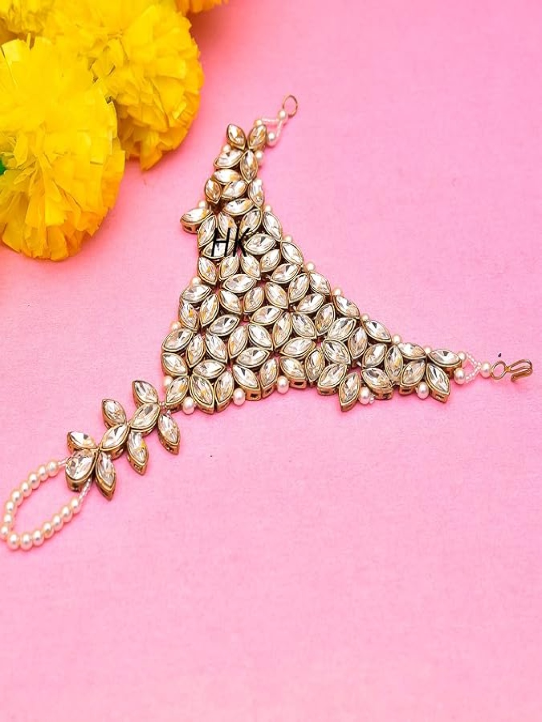 

Kezlin Gold-Plated Kundan Studded Adjustable Haath Phool Bracelet