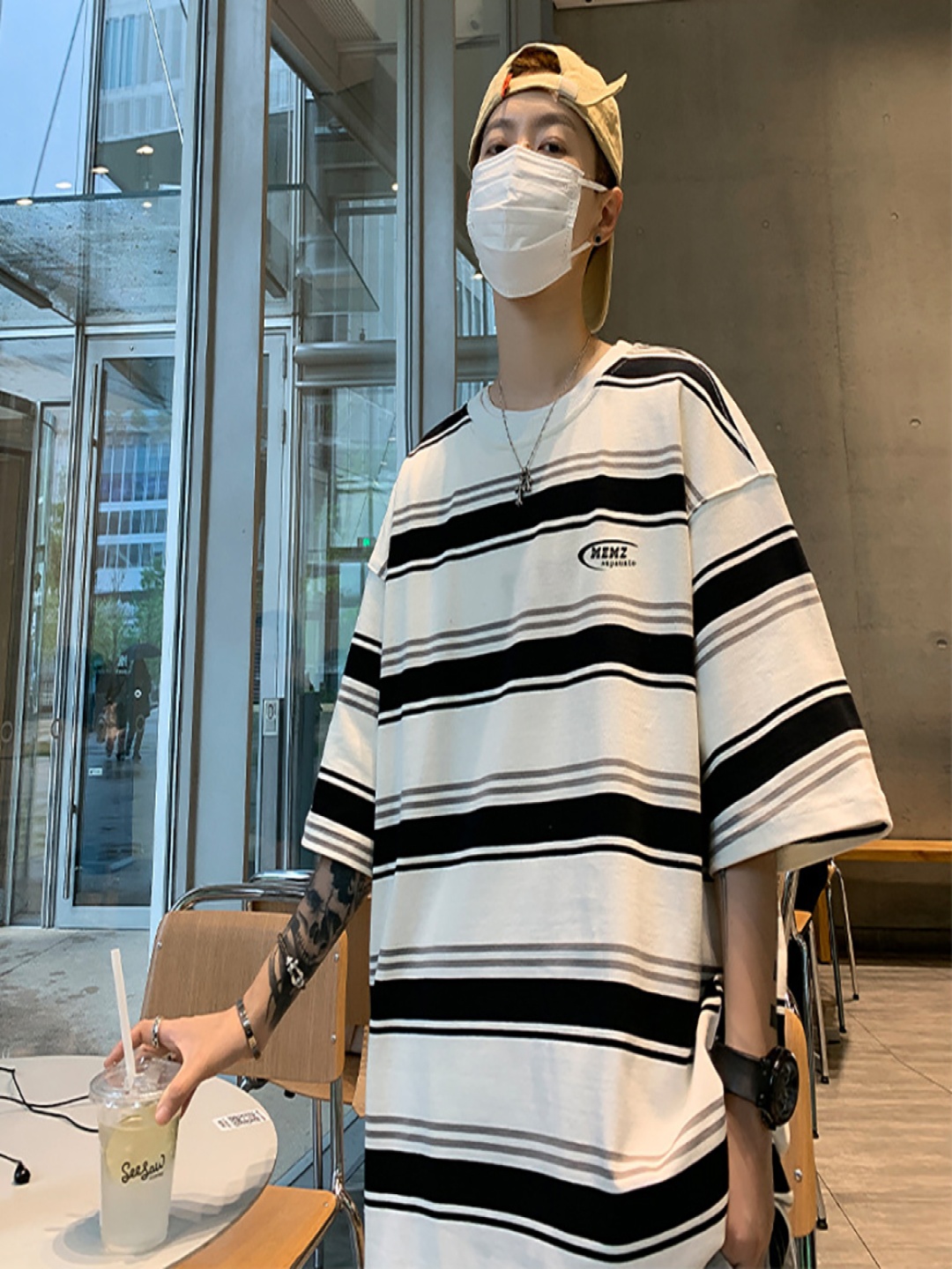 

StyleCast x Revolte Men Striped Round Neck Oversized T-shirt, White