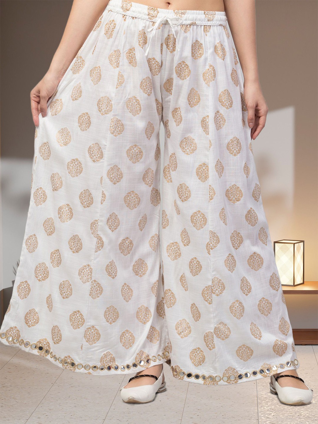

FAMBEE Women Printed Flared Knitted Palazzos, Cream