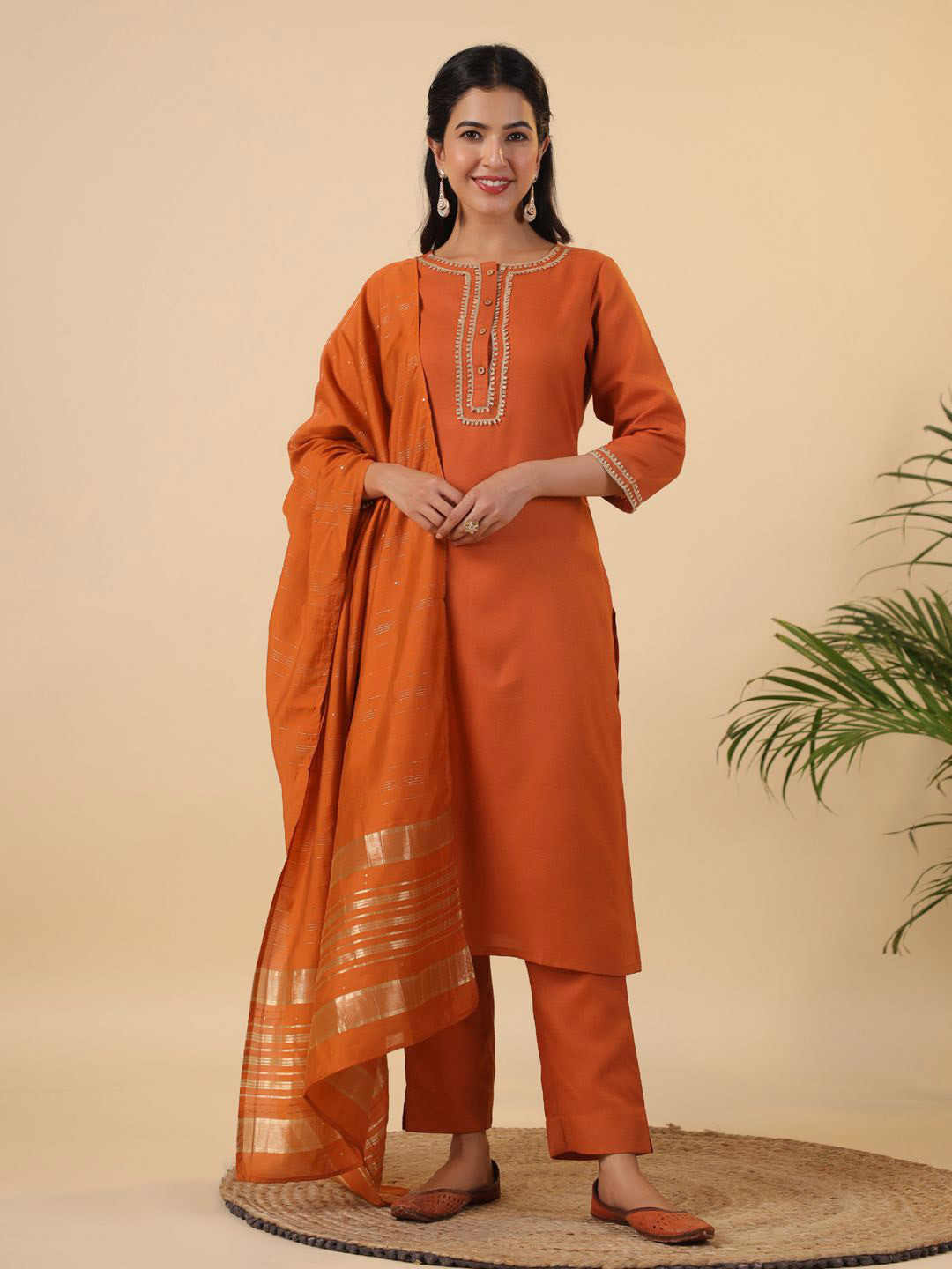 

Janasya Women Yoke Design Regular Gotta Patti Pure Cotton Kurta with Trousers & With Dupatta, Rust
