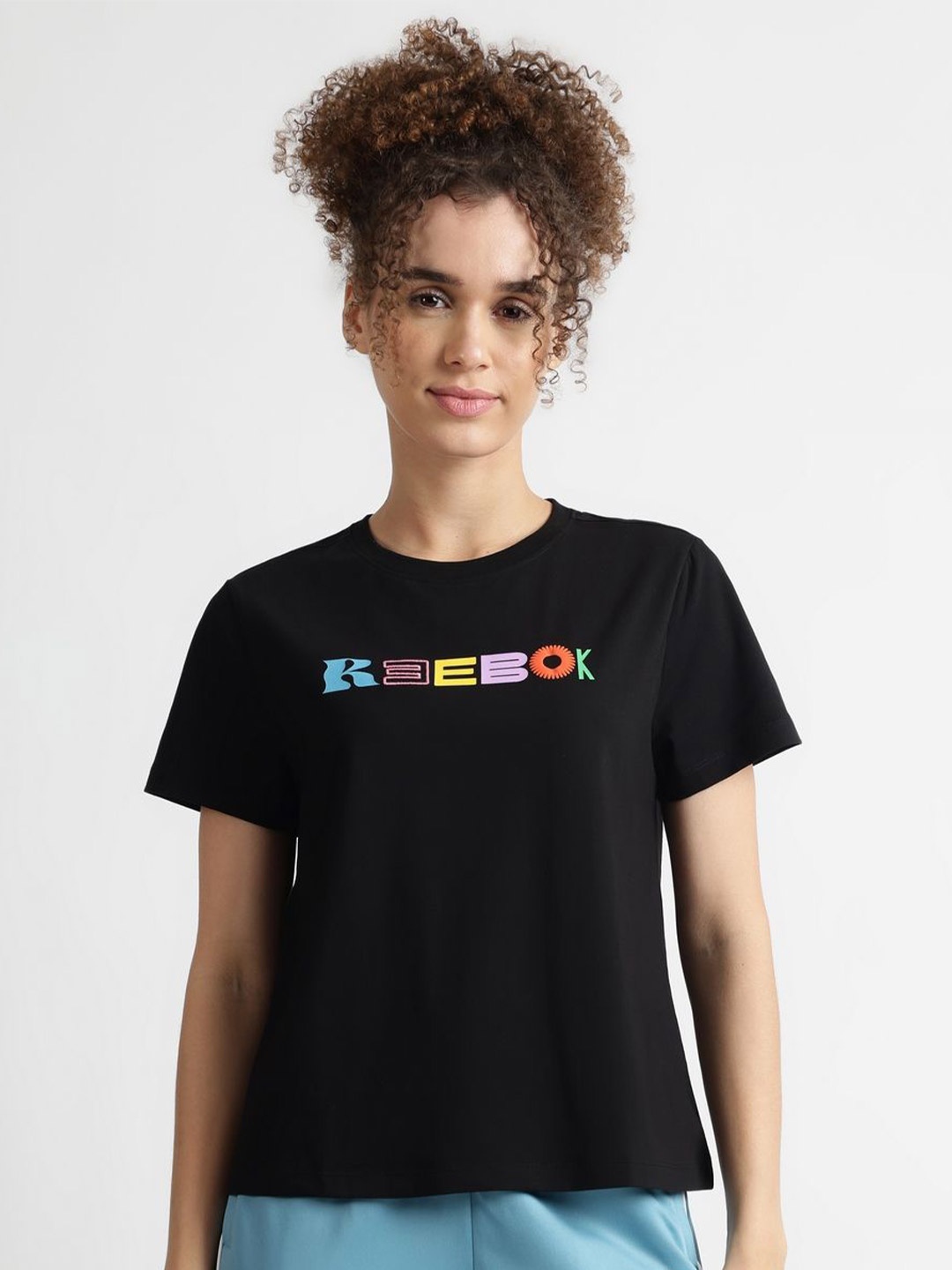 

Reebok Women Typography Printed Short Sleeves Cotton Casual T-shirt, Black