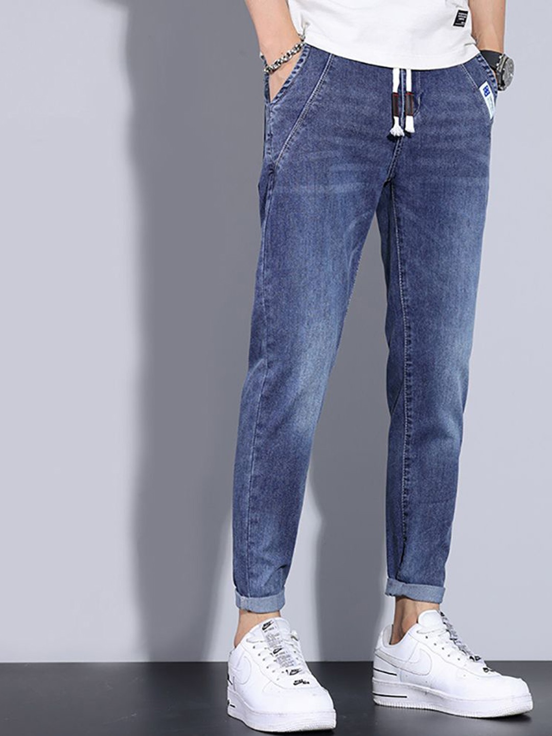 

StyleCast x Revolte Men Bootcut Light Fade Stretchable Jeans, Blue