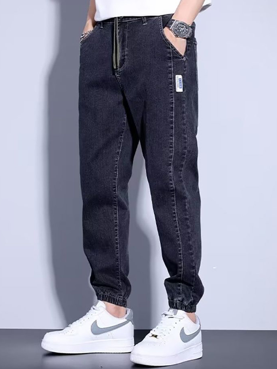 

StyleCast x Revolte Men Relaxed Fit Light Fade Jeans, Black