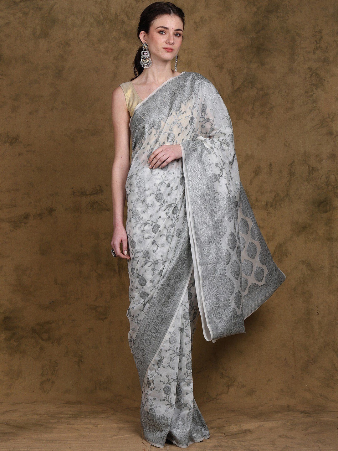 

Exotic India Star White Saree from Banaras with Silver Thread Work Floral Vine