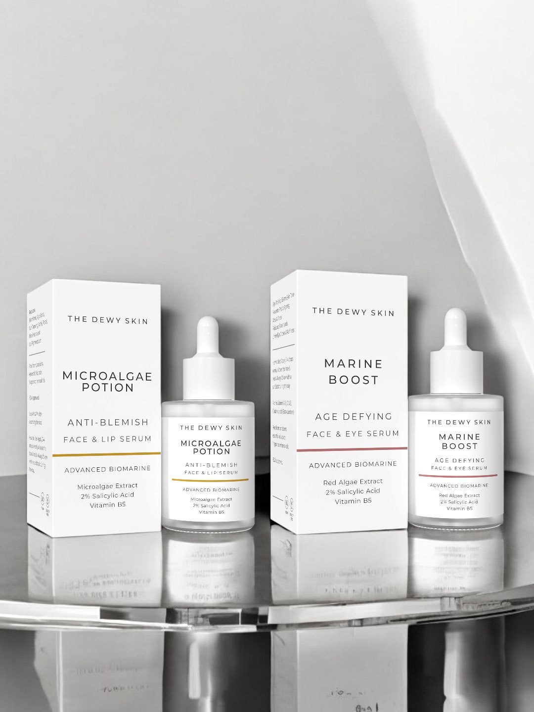 

The Dewy Skin Set Of 2 Marine Boost Age Defying & Microalgae Anti Blemish Serum-30 ml Each, White