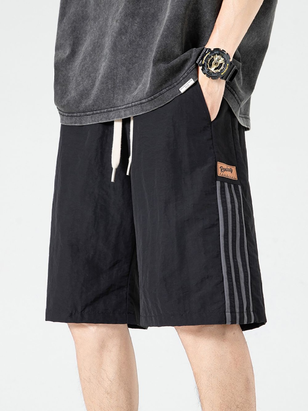

StyleCast x Revolte Men Loose Fit Shorts, Black