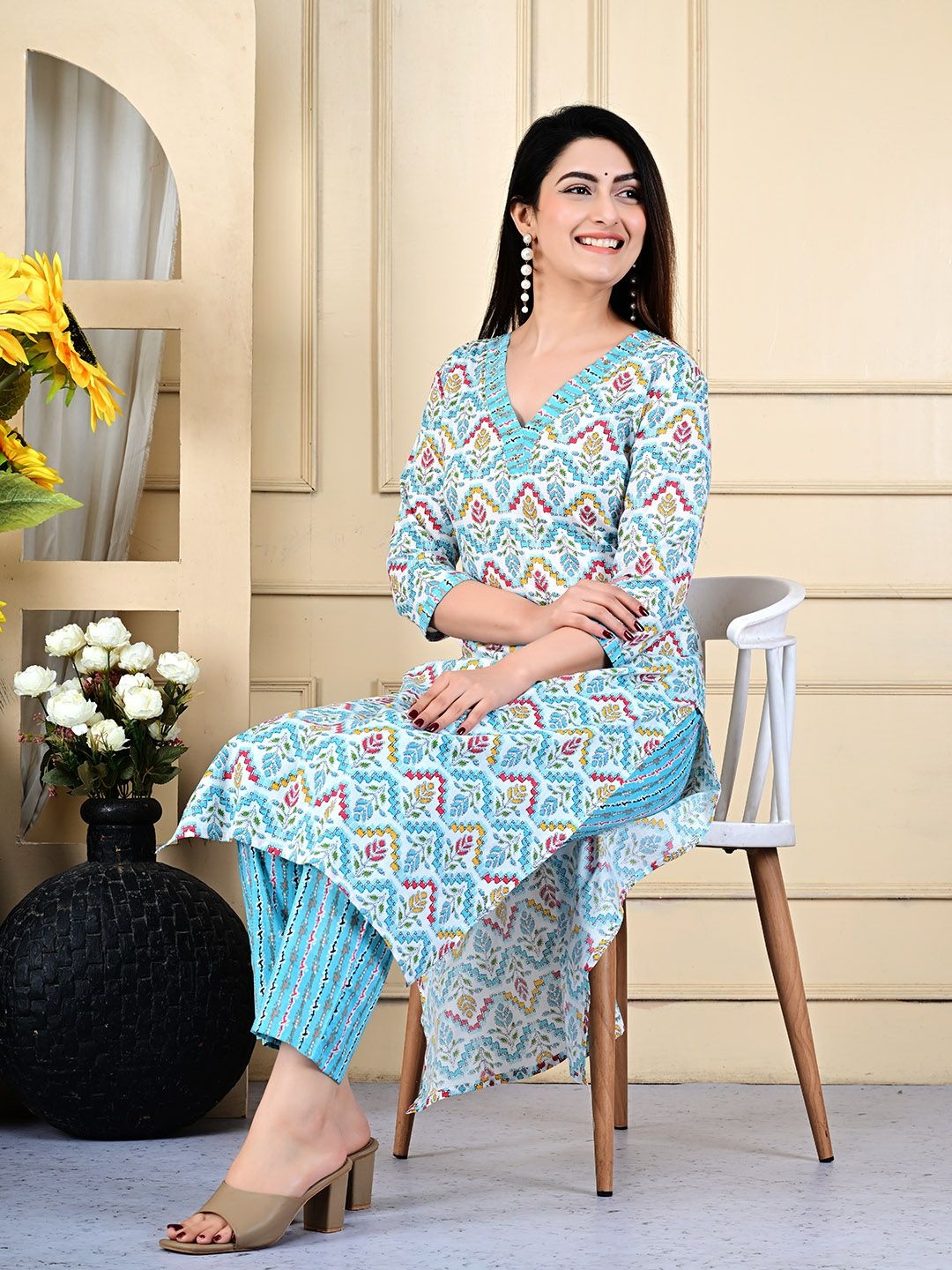 

Meena Bazaar Floral Printed V-Neck Beads and Stones Cotton Straight Kurta With Trouser, Blue