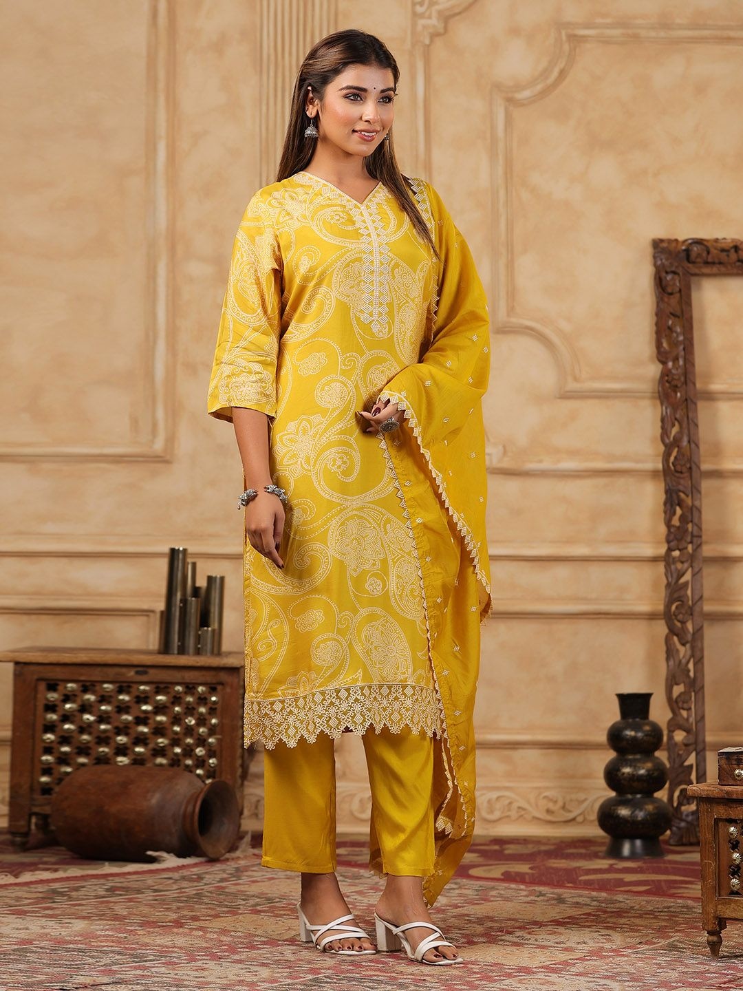 

Meena Bazaar Paisley Printed V-Neck Thread Work Straight Kurta With Trouser And Dupatta, Mustard