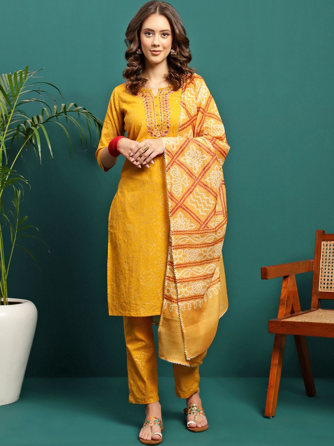 

Sangria Mustard Yellow Floral Embroidered Notch Neck Straight Kurta With Trouser & Dupatta