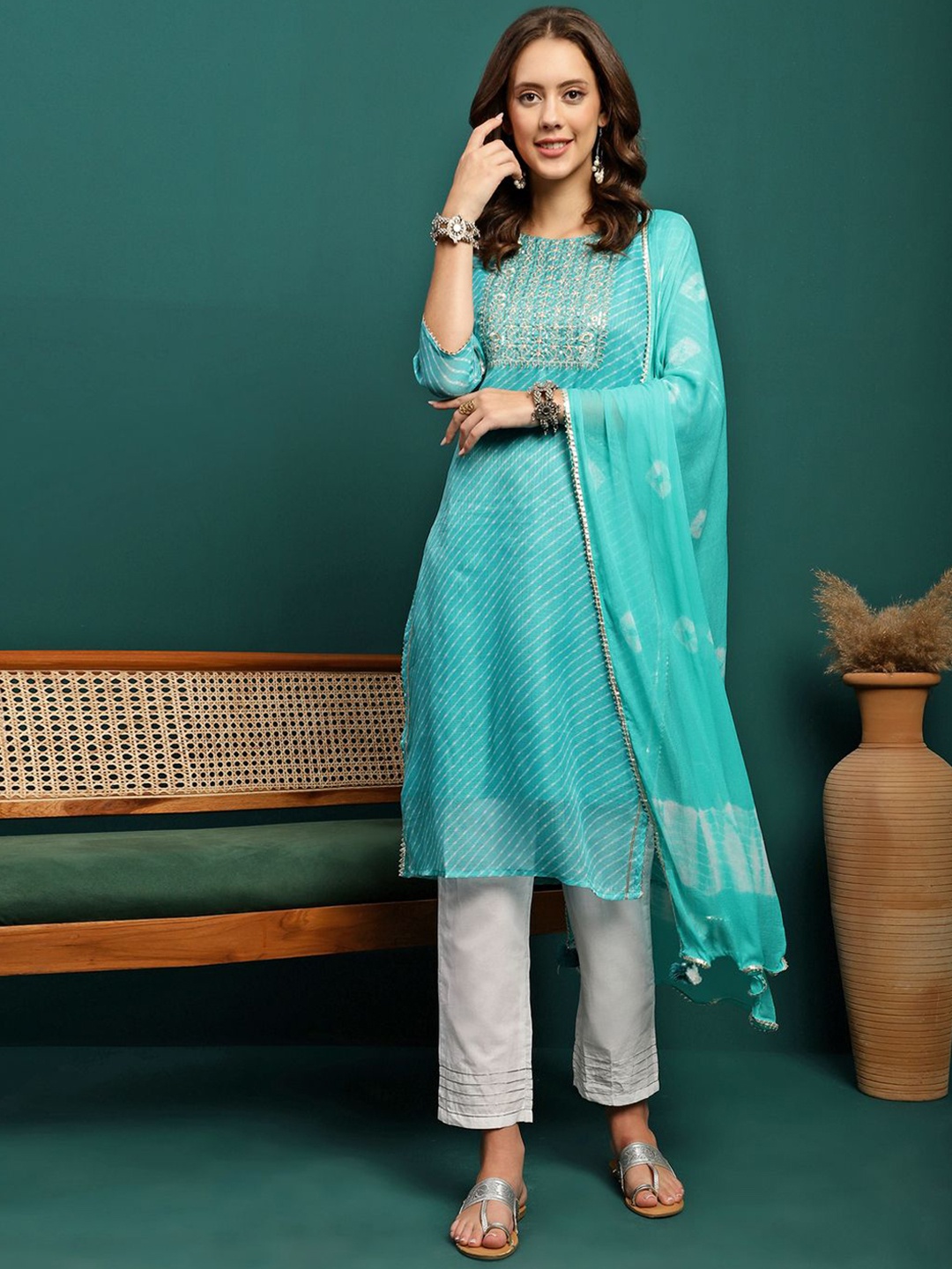 

Sangria Turquoise Blue Leheriya Printed Sequinned Straight Kurta With Trouser And Dupatta.