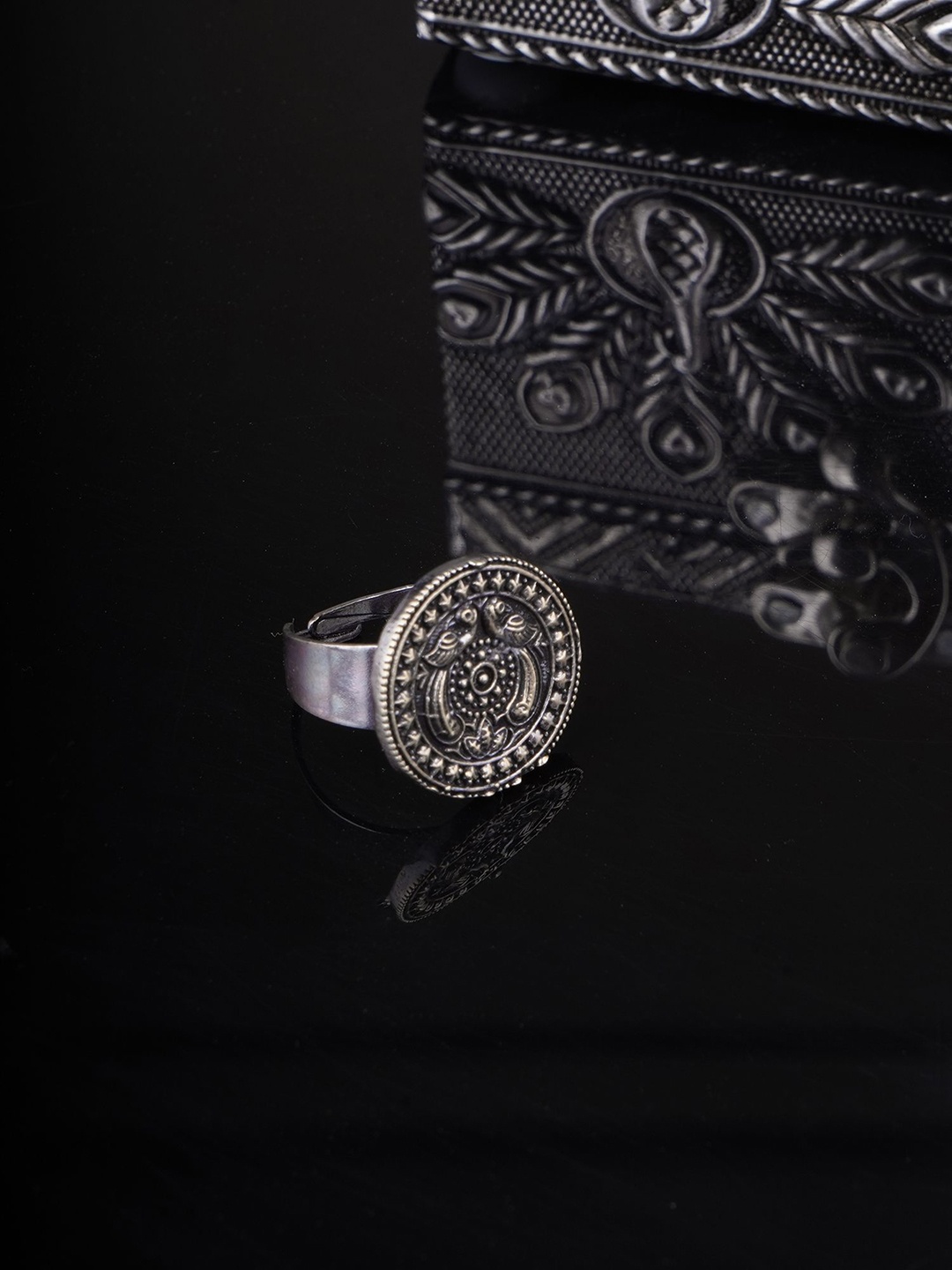 

Sangria Silver Toned German Silver Oxidised Adjustable Finger Ring