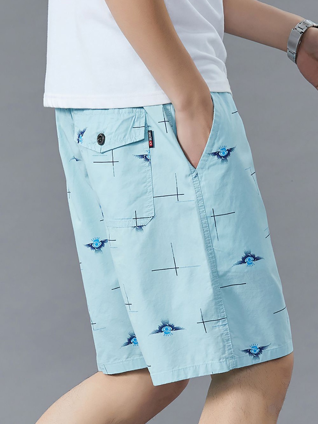 

StyleCast x Revolte Men Conversational Printed Mid-Rise Shorts, Blue