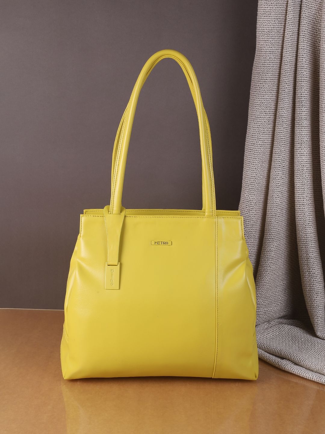 

Metro Women Solid Structured Shoulder Bag, Yellow