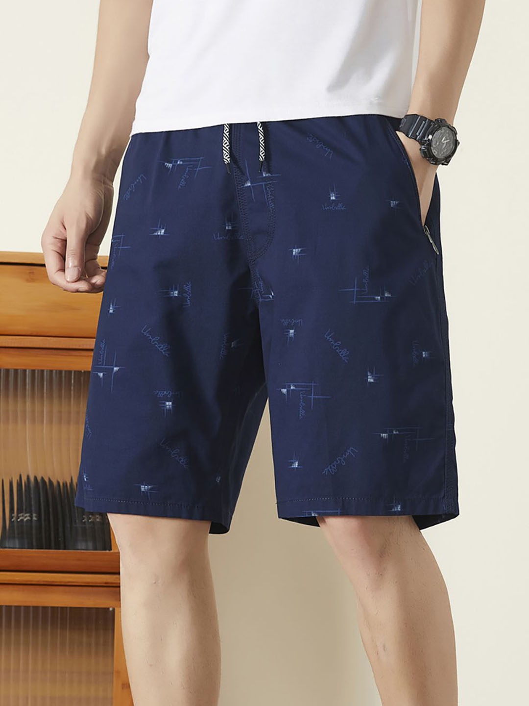 

StyleCast x Revolte Men Printed Shorts, Navy blue