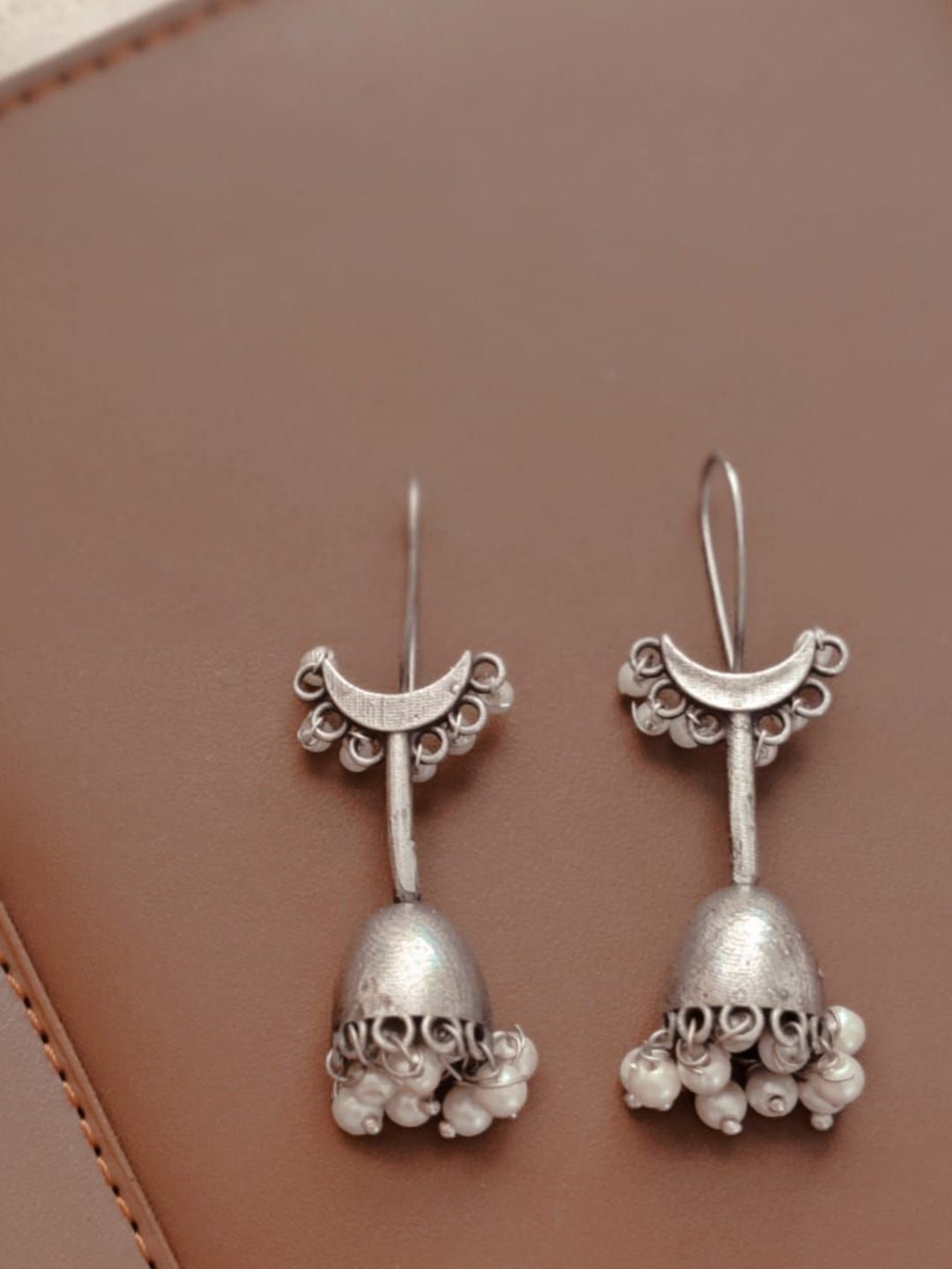 

Janpath Online Oxidised Artificial pearls beaded Dome Shaped Jhumkas, Silver