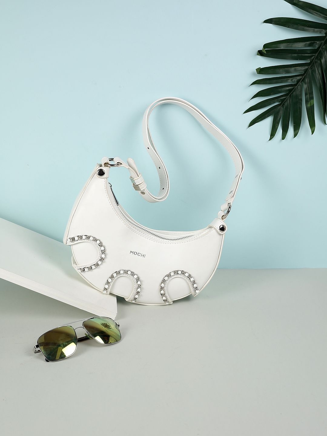 

Mochi Women Solid Half Moon Sling Bag, White