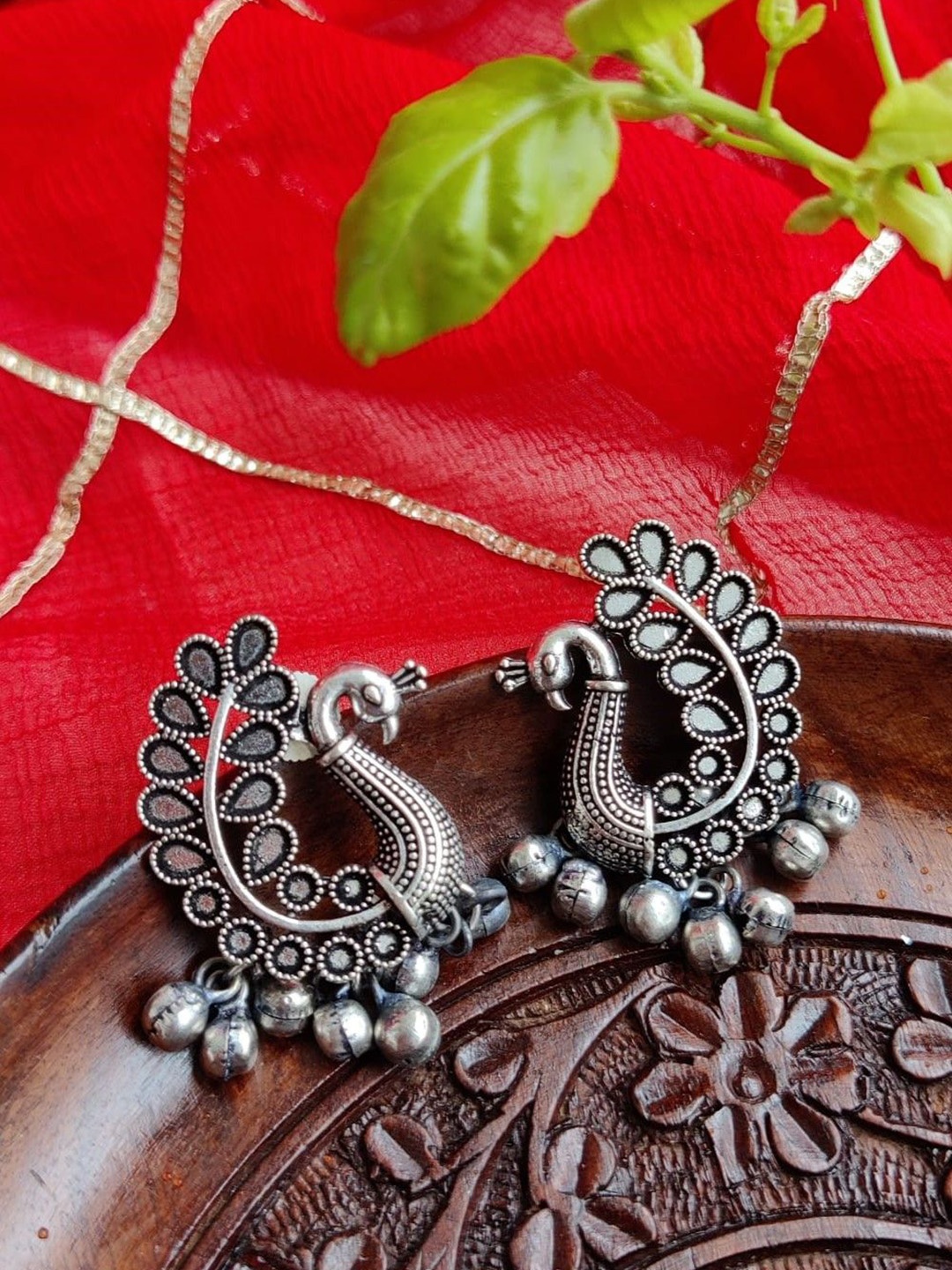 

Janpath Online Oxidised Peacock Shaped Studs, Silver