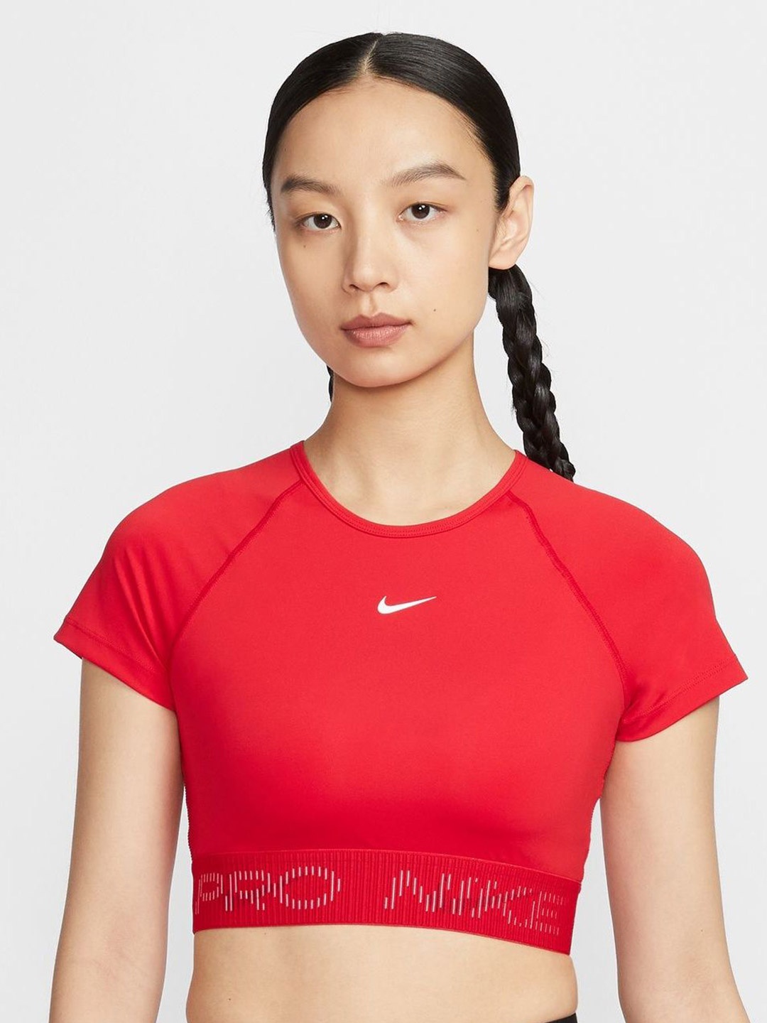 

Nike Pro Womens Dri-FIT Short-Sleeve Cropped Graphic Top, Red