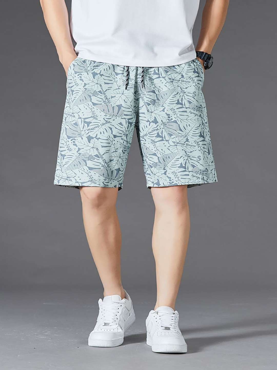 

StyleCast x Revolte Men Conversational Printed Shorts, Green