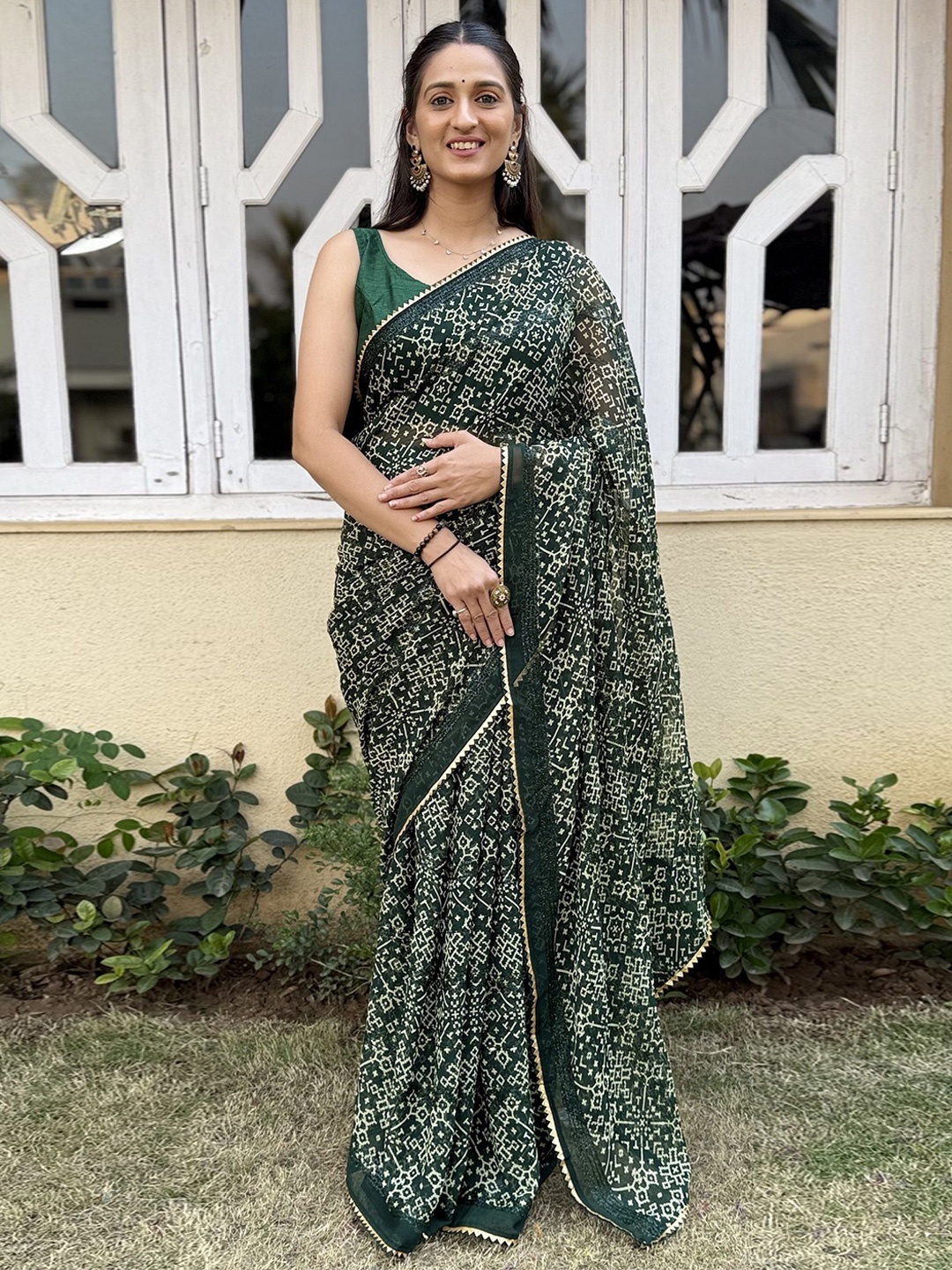 

A TO Z CART Ethnic Motifs Pure Chiffon Saree, Green