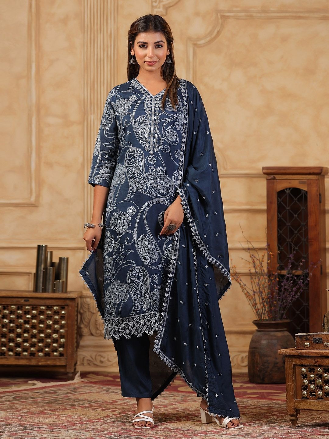 

Meena Bazaar Floral Printed V-Neck Thread Work Straight Kurta With Trouser And Dupatta, Blue
